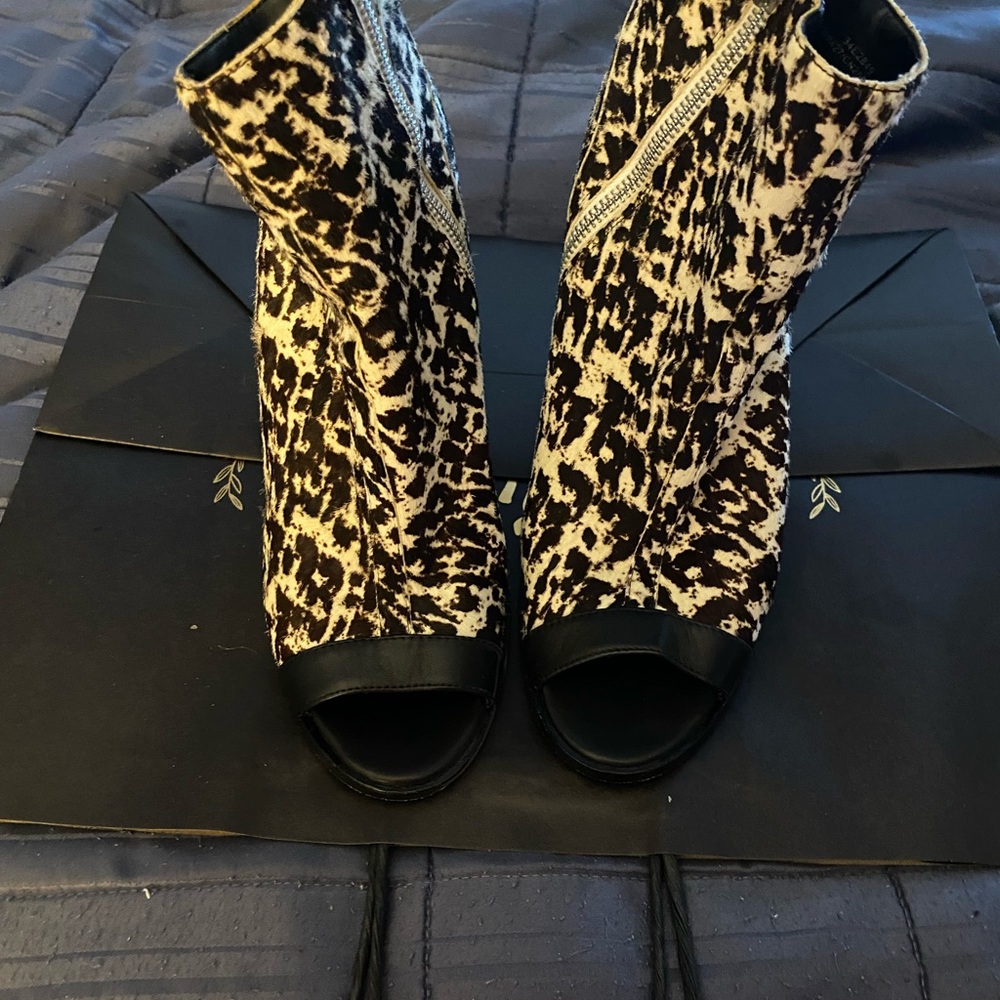 Calvin Klein size 10 suede Cheetah print ankle boot.